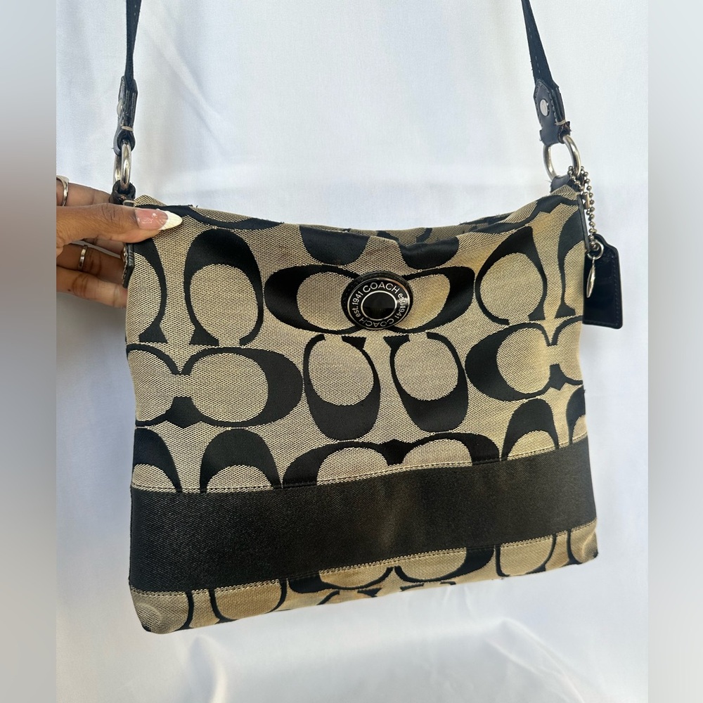 Coach Black and Tan Crossbody Bag with Signature Design